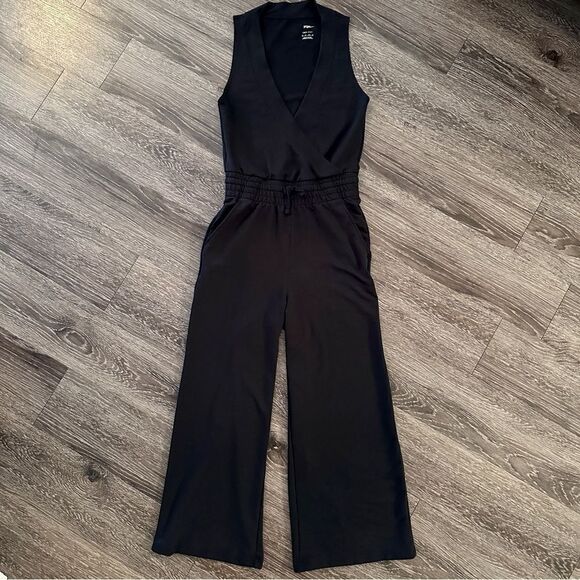Nike Women's Yoga​ Dri-FIT Fleece French Terry Jumpsuit - Picture 1 of 6